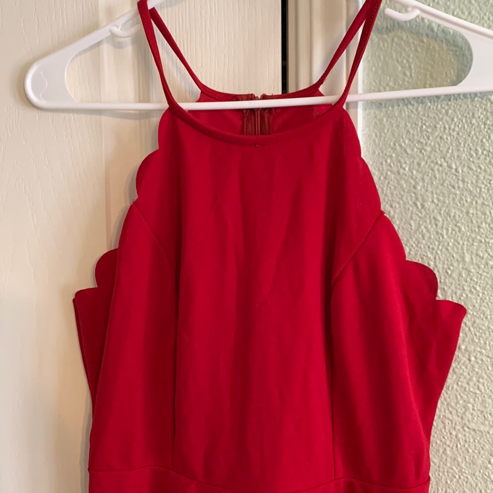 High, scalloped neck red dress. Size small. A-line and above knee.